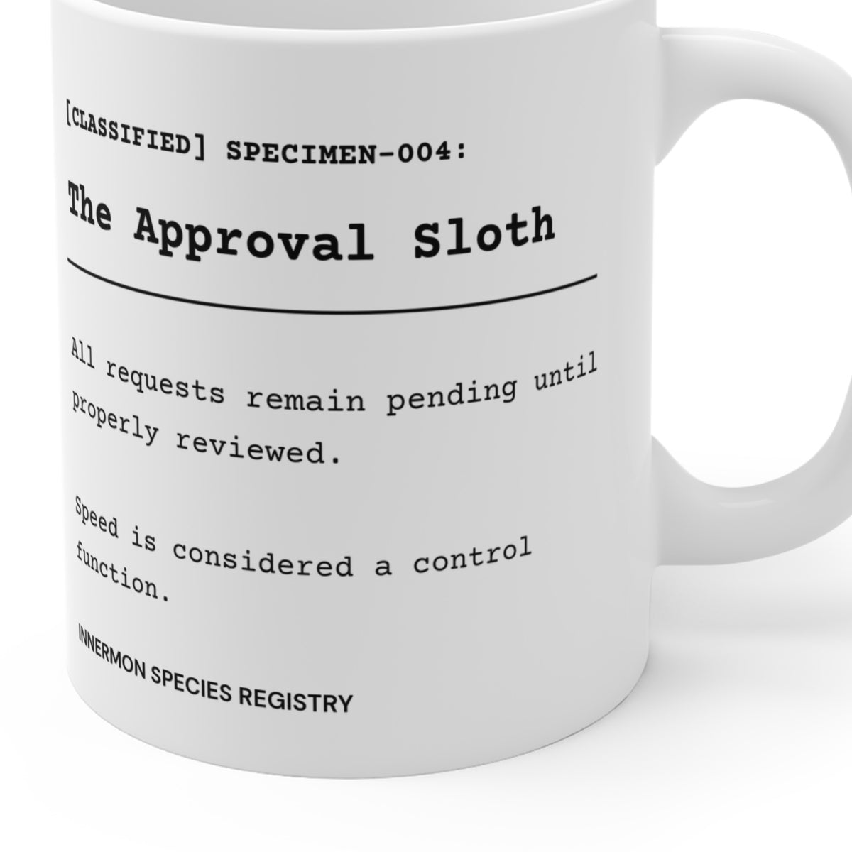 Close-up of the printed Species File and registry footer on the Approval Sloth mug; partial mug view showing the actual curved print.