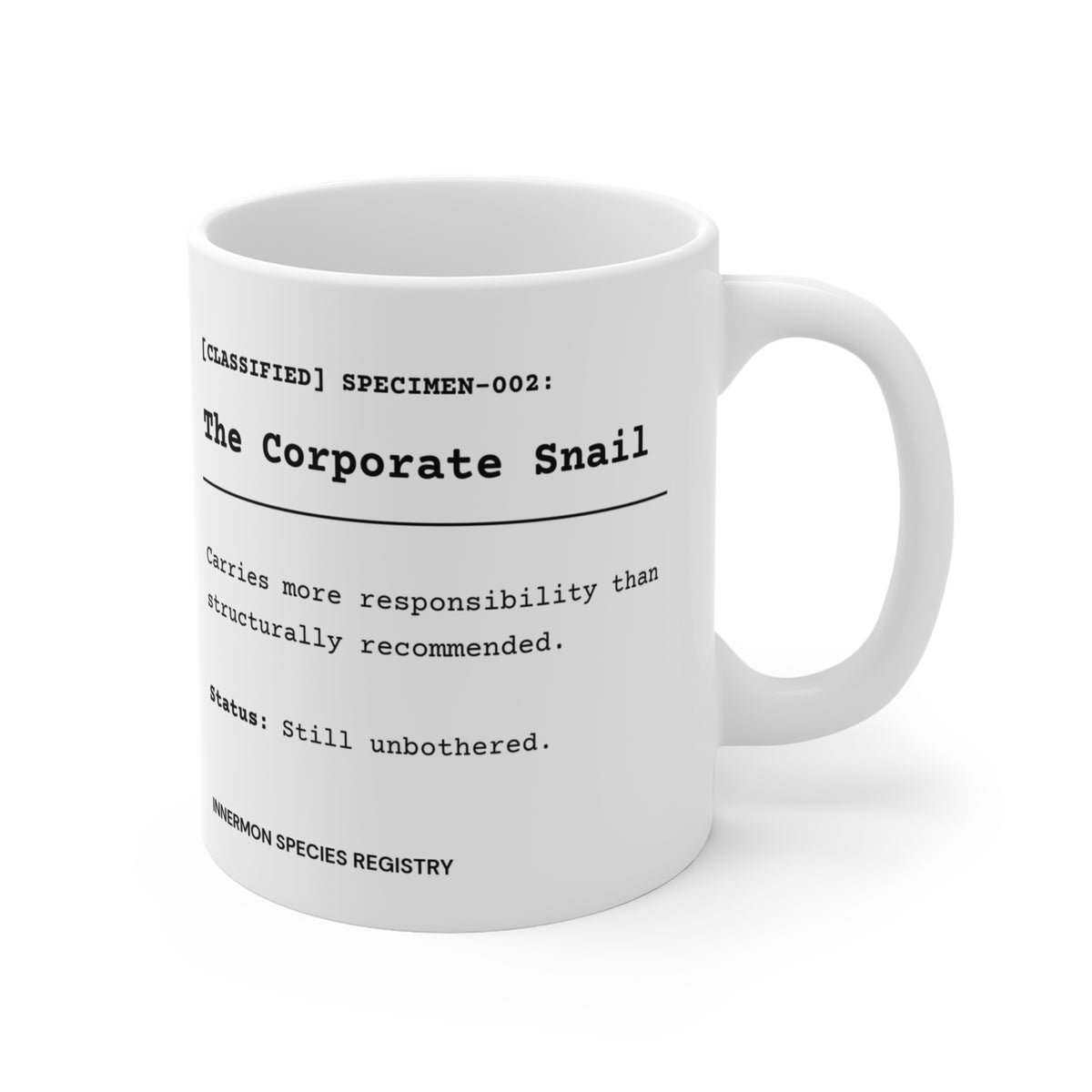 The Species File text on the reverse of the white 11oz The Corporate Snail mug, handle on the right.