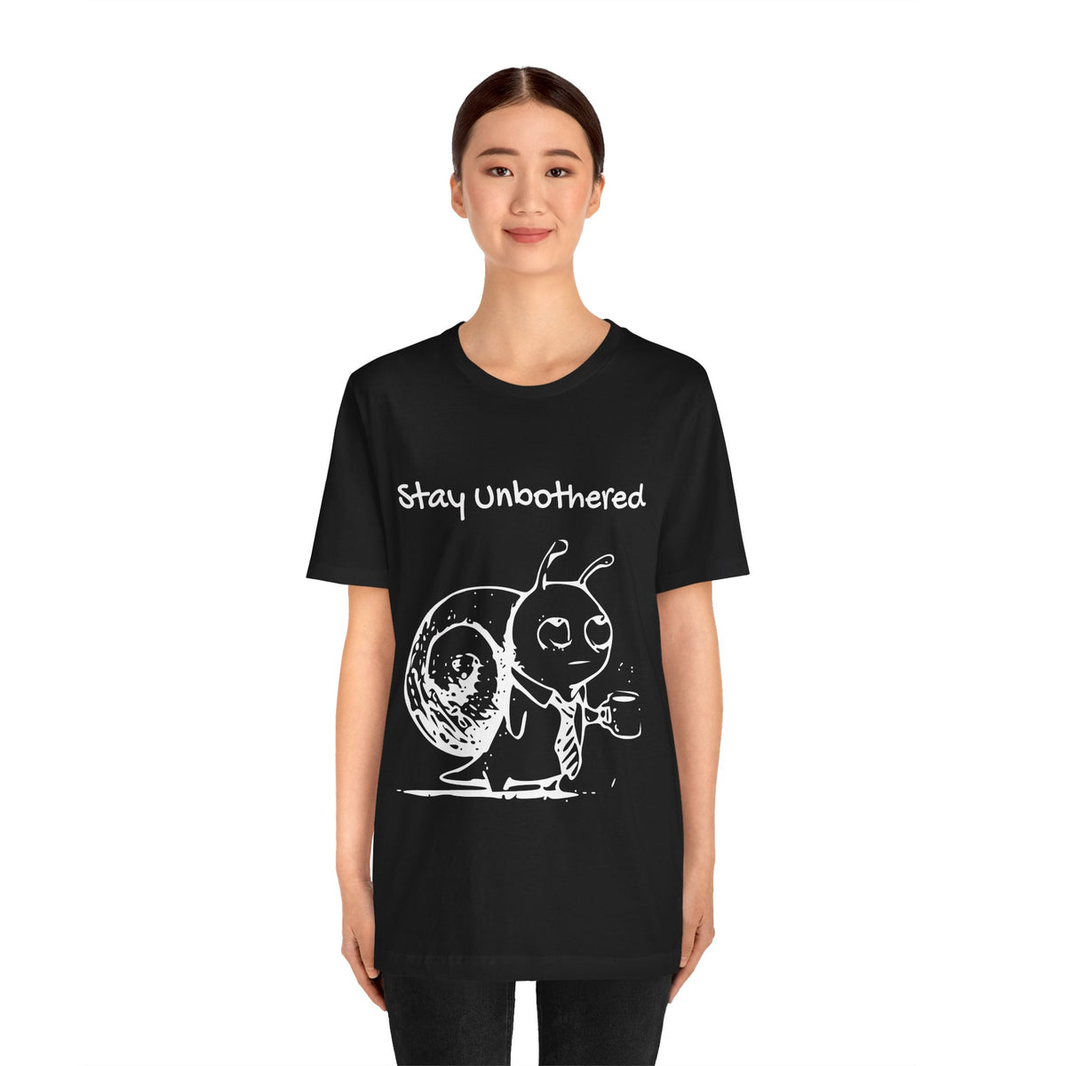 Model wearing the black Stay Unbothered Snail T-shirt, showing the front graphic and garment fit.