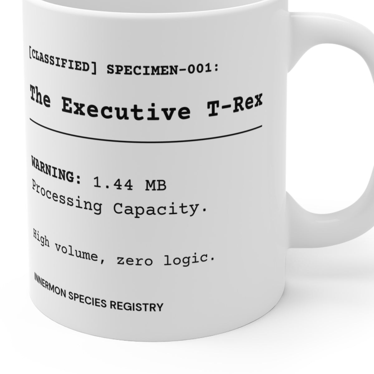 Close-up of the printed Species File and registry footer on the Executive T-Rex mug; partial mug view showing the actual curved print.
