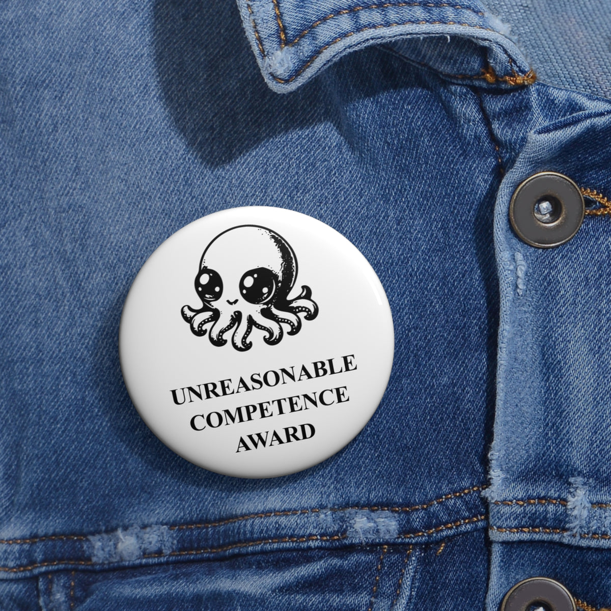 Super Octopus award badge, one 2.25-inch badge shown on denim