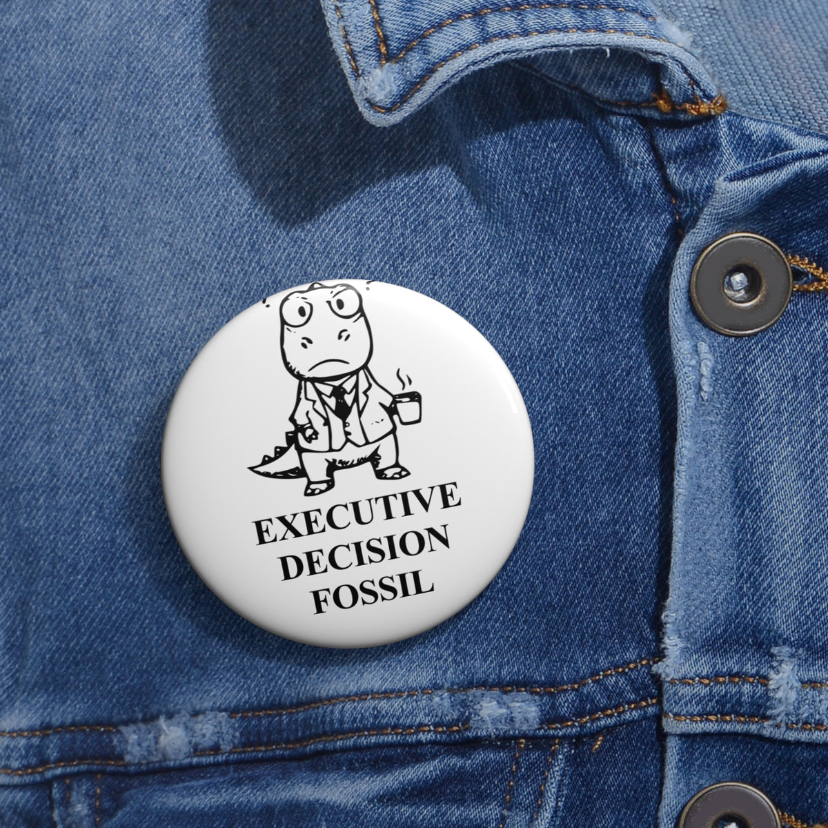 Executive T-Rex award badge, one 2.25-inch badge shown on denim