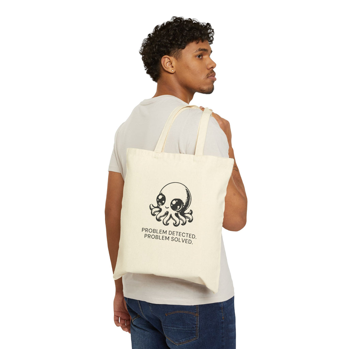Super Octopus natural canvas tote, front print shown in a worn view